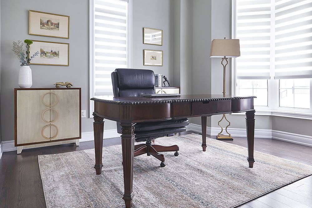 Stylish home office with personalized art and ergonomic design elements.